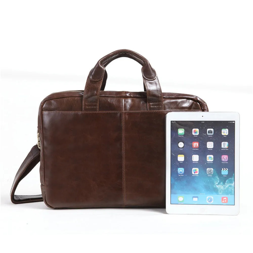 Brown men's leather briefcase with a textured pattern, shown with an open view of the polyester cotton lining.