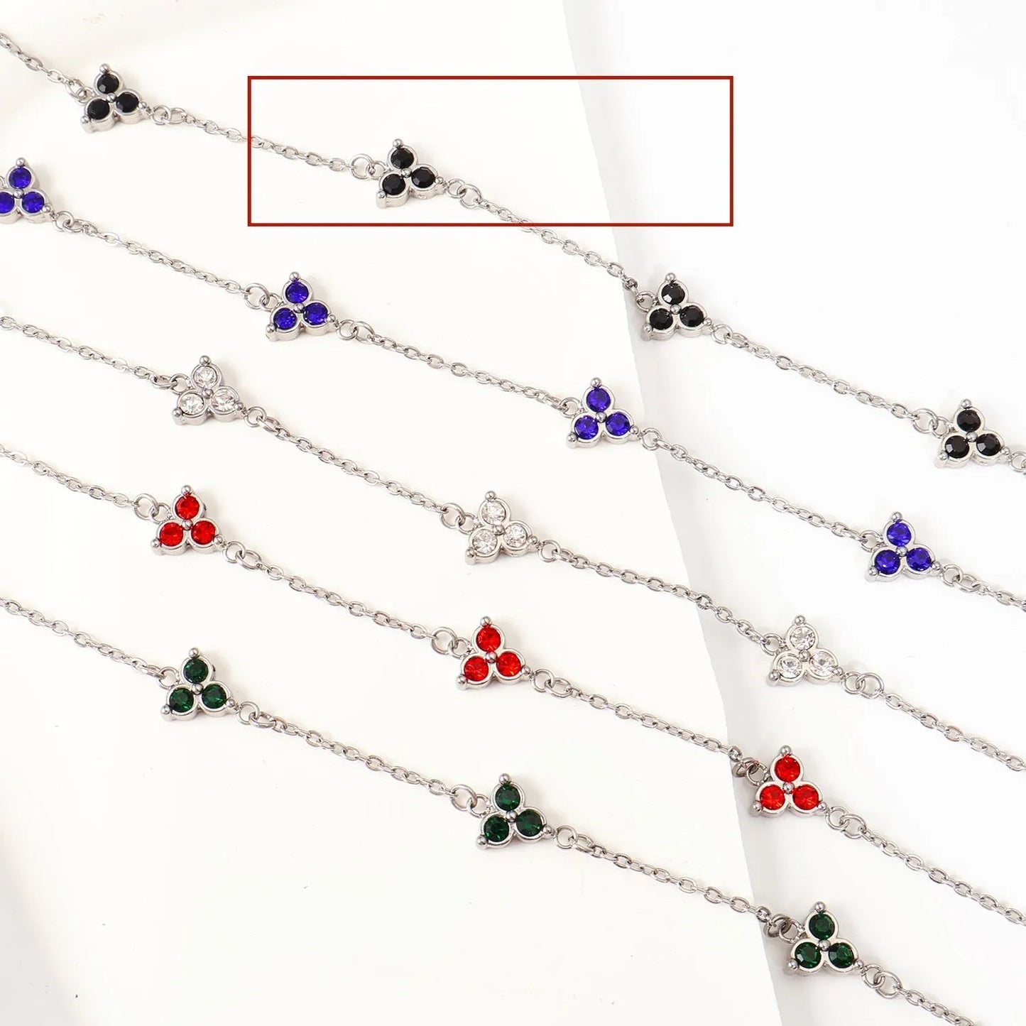 Women's stainless steel three diamond geometric triangular bracelet in gold finish with white zircon gemstones