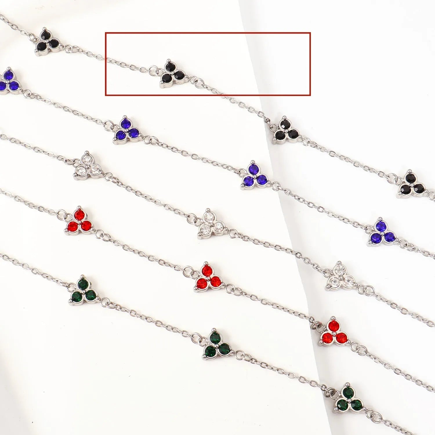 Women's stainless steel three diamond geometric triangular bracelet in gold finish with white zircon gemstones