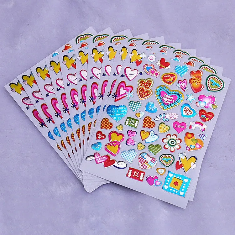 100 gold foil glitter heart reward stickers on backing sheet, approximately 20mm diameter
