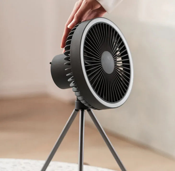 White camping fan mounted on aluminum tripod with Type-C charging cable