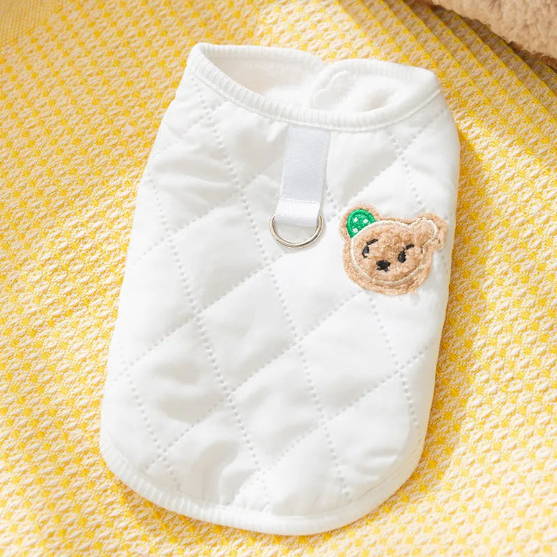 Quilted pet vest for small dogs with bear patch and polka-dot ears, padded dog gilet in cream or beige, sizes XS to XL.
