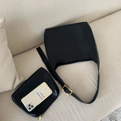 Women's soft PU shoulder bag measuring 28cm by 32cm by 12cm with swing thread details