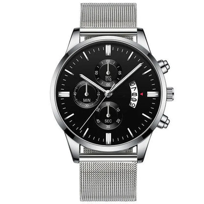 Men's stainless steel mesh band quartz watch with analog dial on a wrist.