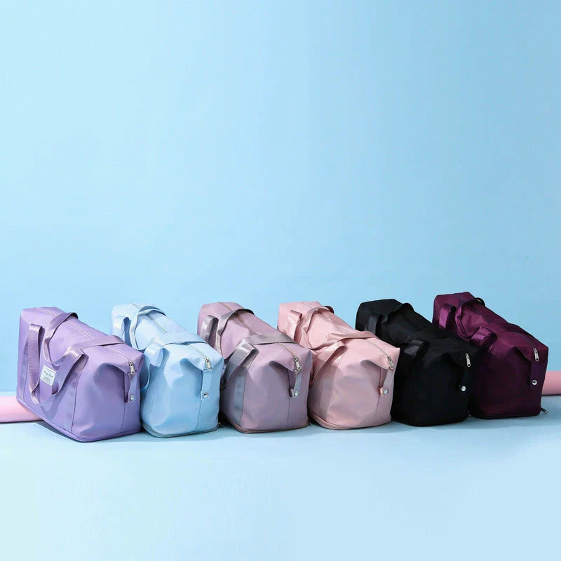 Spacious gym travel bag in various colors, featuring multiple pockets and comfortable carrying handles for workout, yoga, and outdoor use.