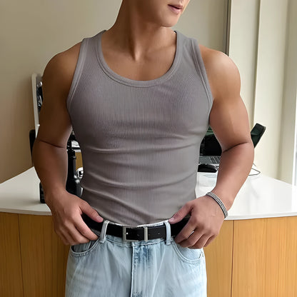 Men's tight-fitting grey sports t-shirt with a round neck, shown flat.