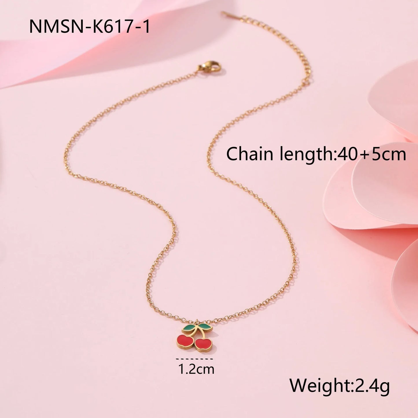 Cherry jewellery set with necklace, bracelet, earrings and ring in gold electroplated stainless steel with geometric fruit design