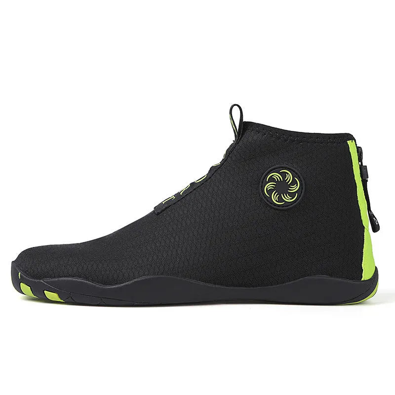 Mid-top outdoor beach shoes in black and fluorescent green with mesh upper and rubber sole.