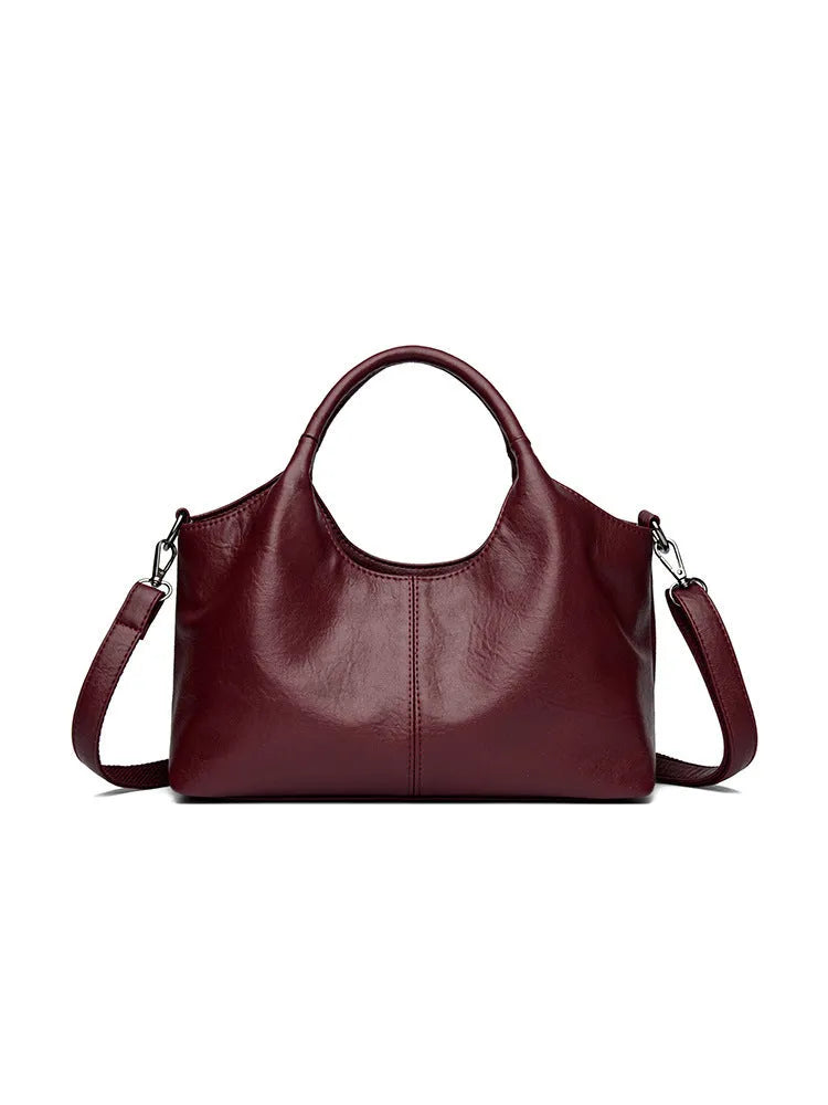Women's soft genuine leather large crossbody bag shown in available colours: black, brown, wine red, yellow, beige, bronze, green.