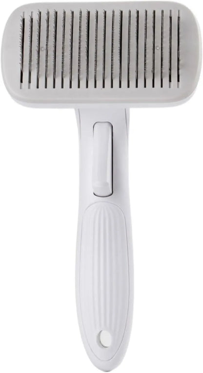 Blue automatic pet comb with one-click button for removing dog and cat hair on a table.
