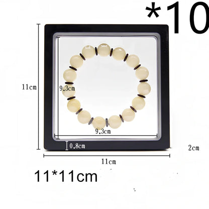 Black 11x11cm suspended 3D floating display frame holding a coin, with square base for stable collectible showcase