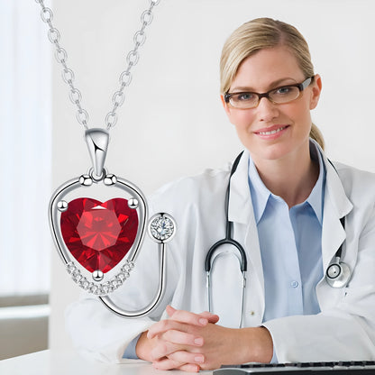 Women's fashion necklace with wings cross stethoscope pendant in red diamond colour