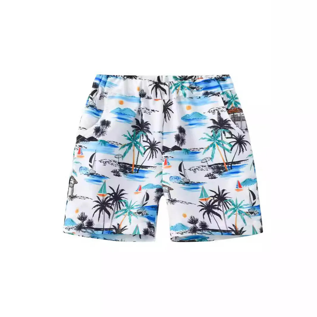 Multi-colour printed beach shorts with hairband belt on a mid-waist, shown in a casual summer style.