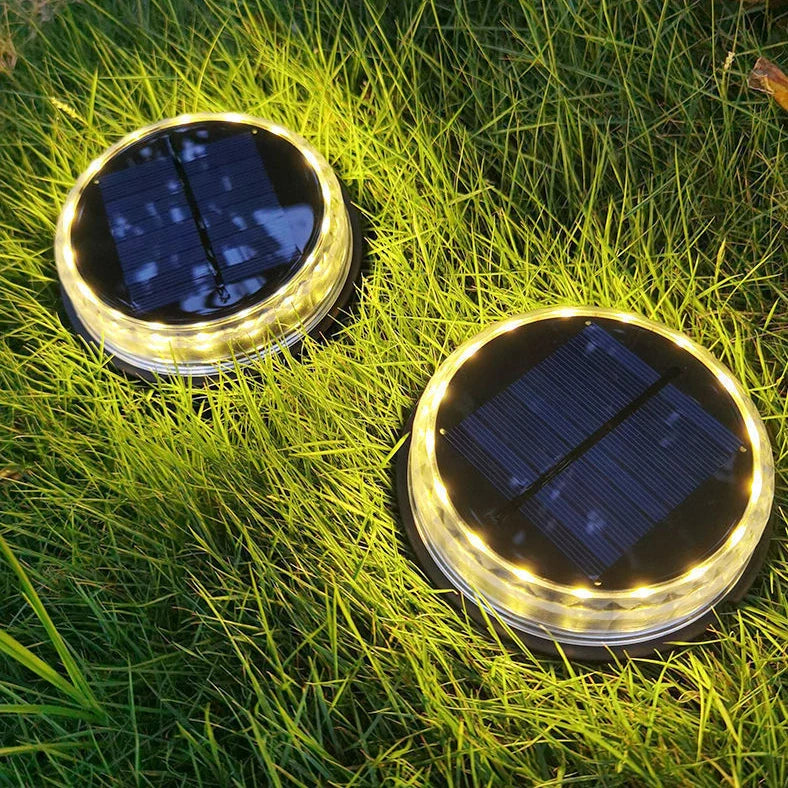 Square solar buried light with solar panel, 121mm dimensions, installed flush with ground surface