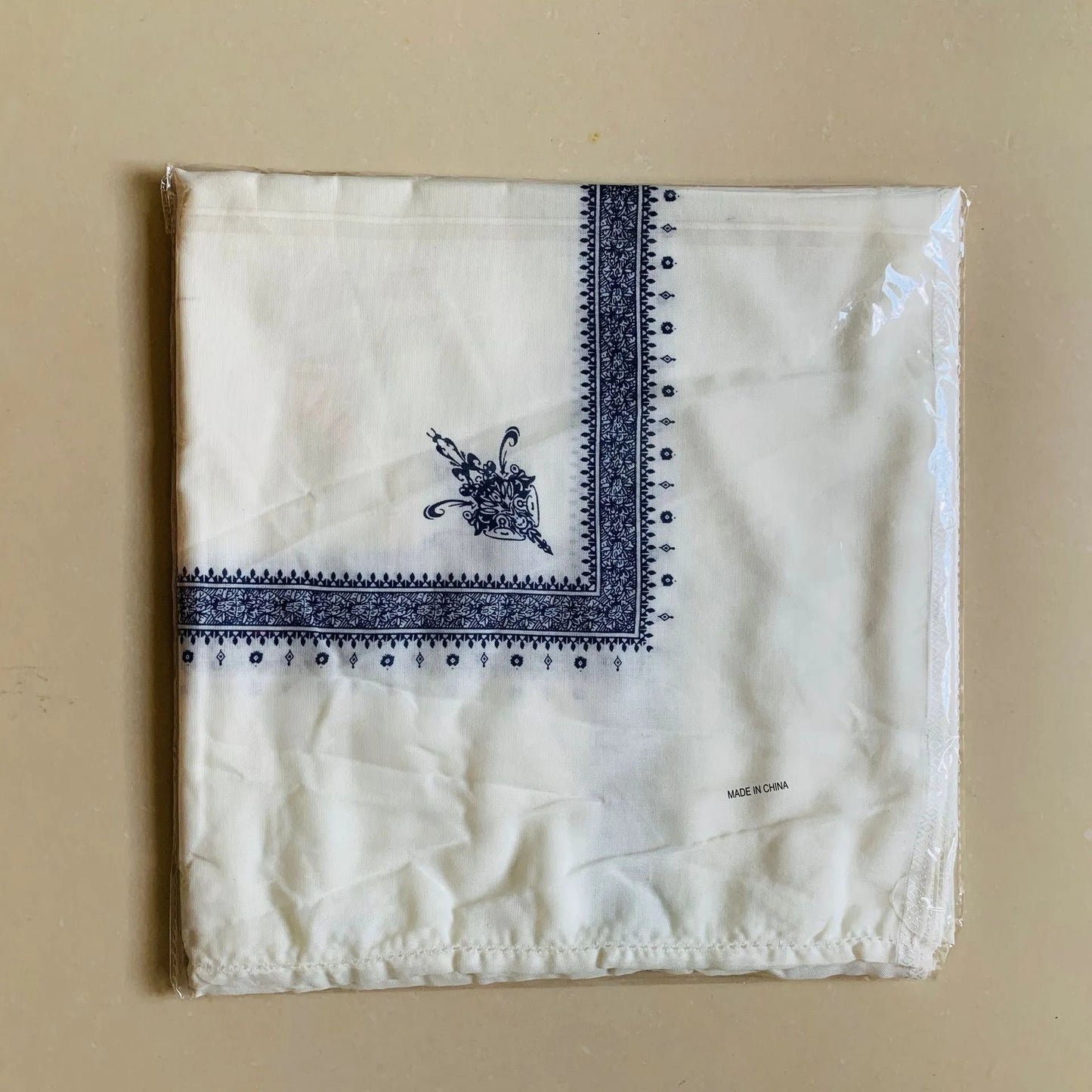 Printed square polyester scarf showing 138 cm dimensions with colour options including brown, grey, green, purple, magenta and dark blue