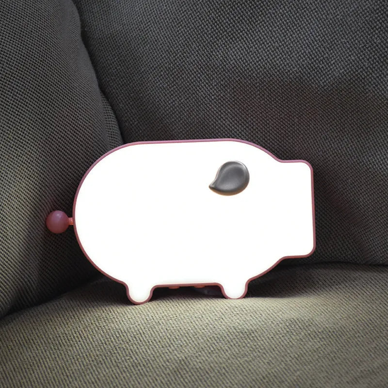 Blue LED alarm clock showing time and temperature with two USB charging ports