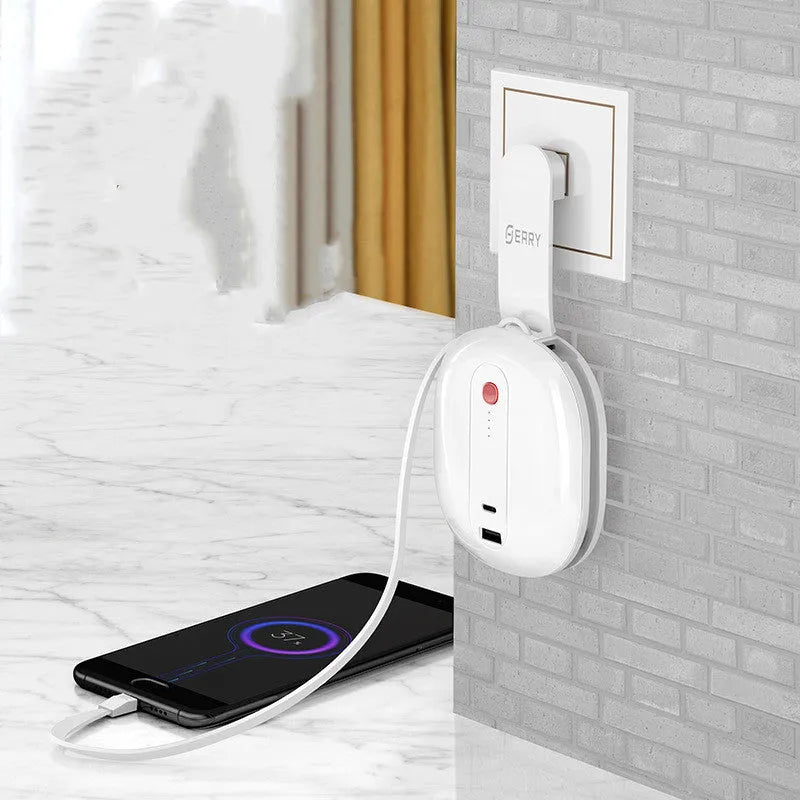 White two-in-one power bank with integrated plug showing 10000mAh capacity