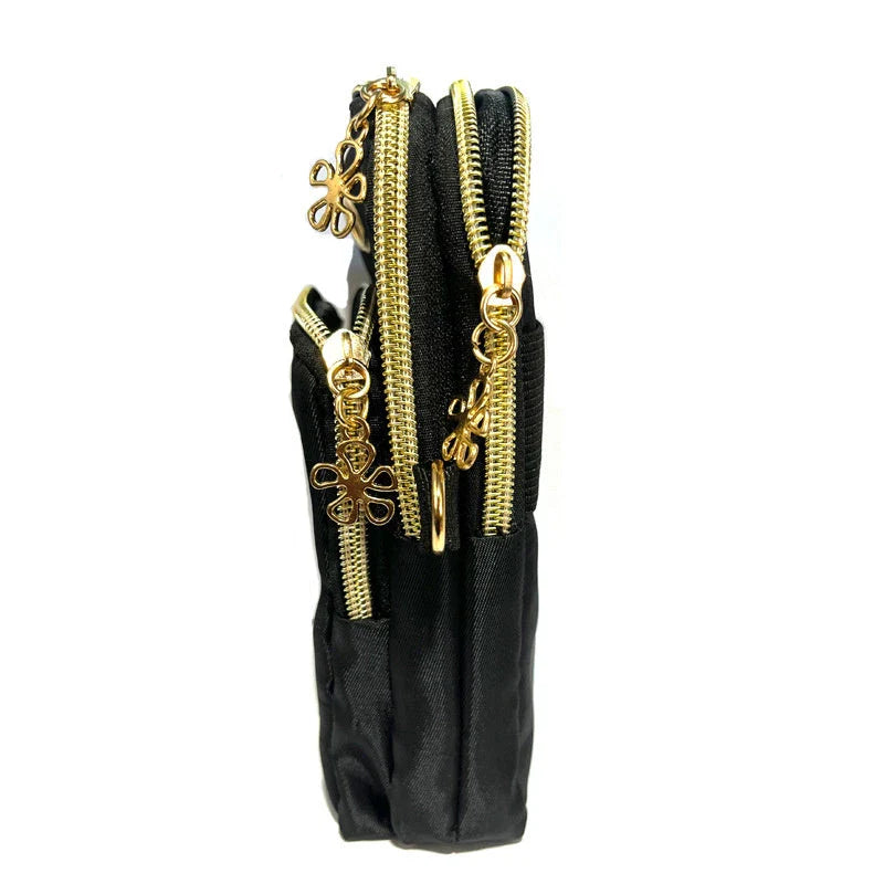 A black crossbody bag with a pumpkin pattern, perfect for Halloween celebrations and everyday use.