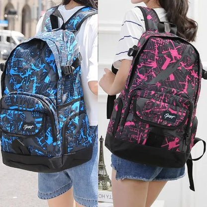 Blue nylon backpack showing front organisational pockets, side water bottle holder, and adjustable shoulder straps