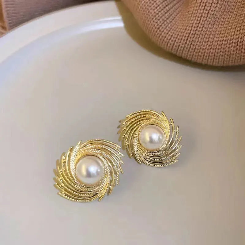 Alloy pearl flower earrings with electroplated finish feature irregular vintage-inspired design offering affordable luxury style for female jewellery wearers seeking elegant vintage pearl earrings with unique visual appeal