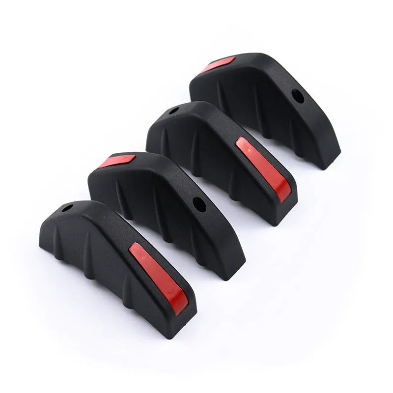 Black triangular car rear spoiler made of ABS plastic, 15cm wide, with mounting screws and adhesive.