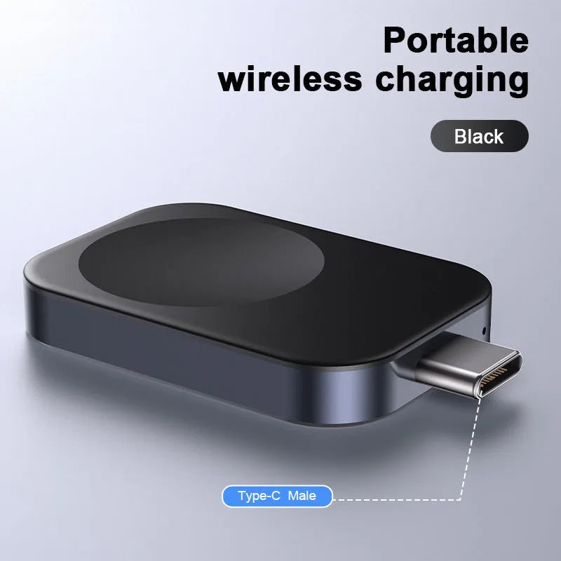 Compact black and white 3-in-1 magnetic wireless charger with integrated cables, shown next to a smartphone for scale.