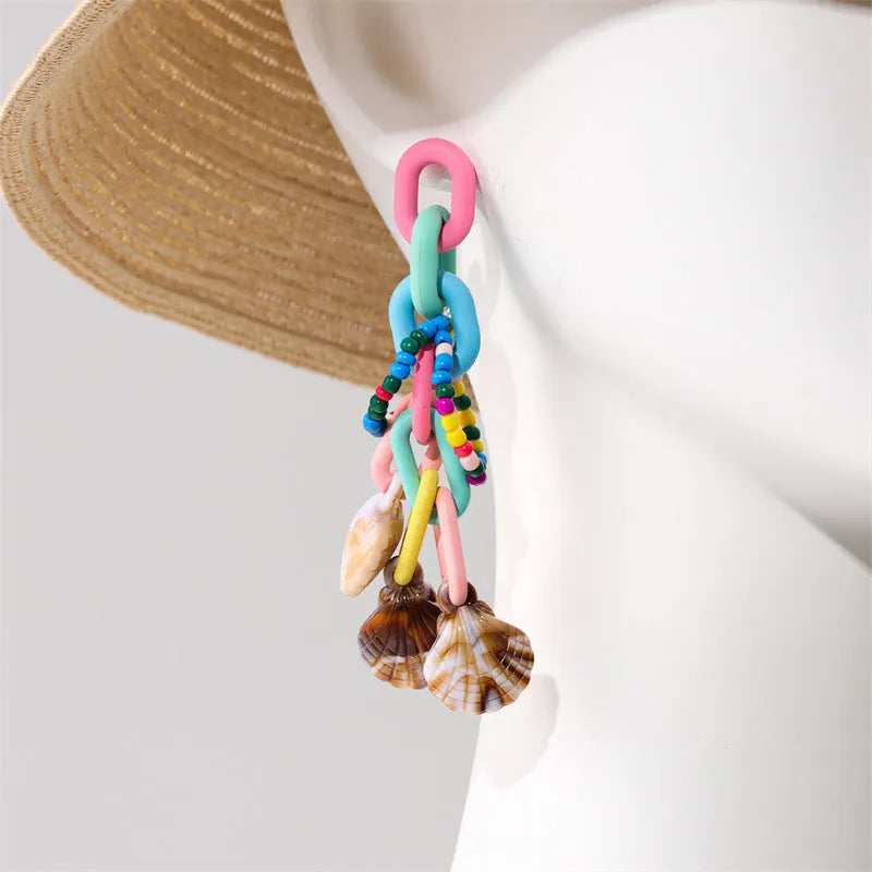 Handmade bohemian shell tassel earrings for women with colourful flower and geometric drop design