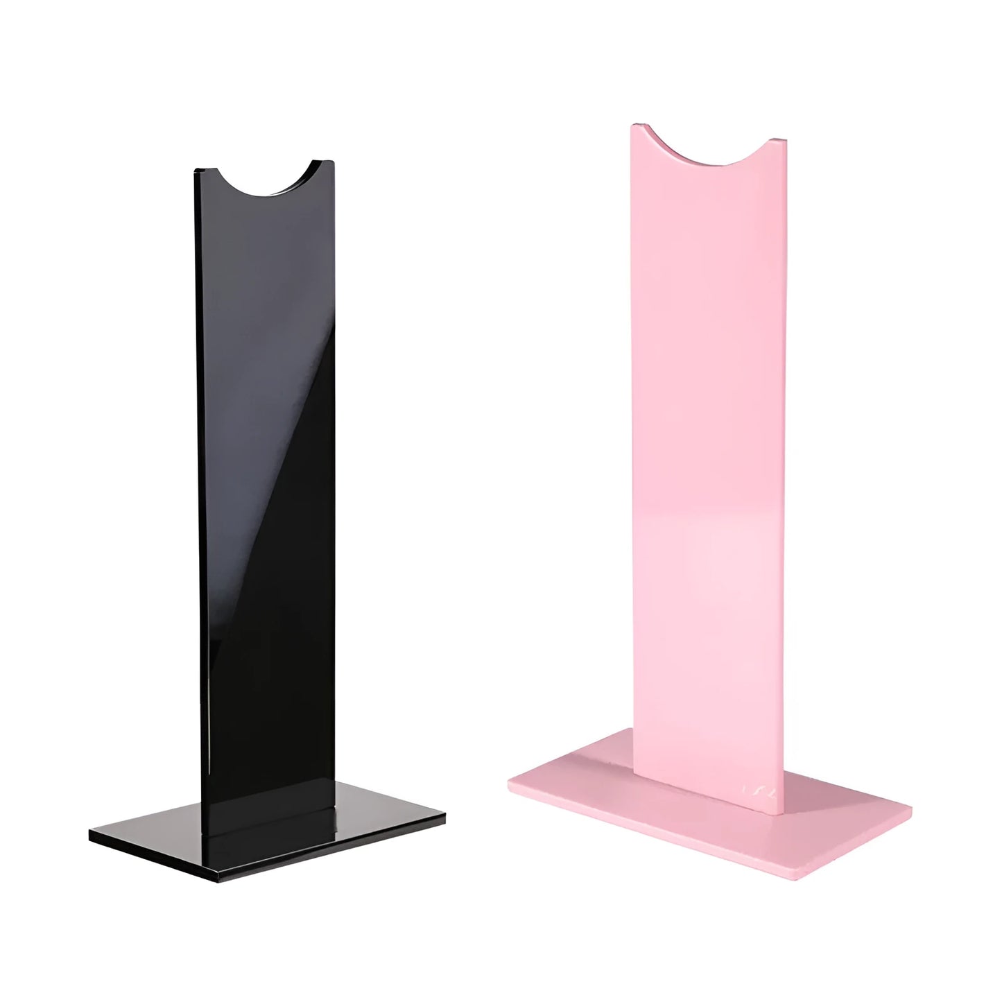 Pink and black detachable headset stand with non-slip silicone base on a desk.
