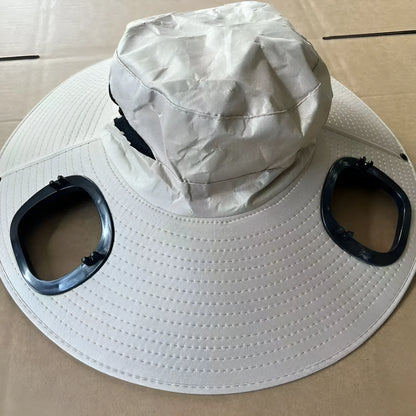 Grey men's solar fan cap with large brim and integrated fan on the front.
