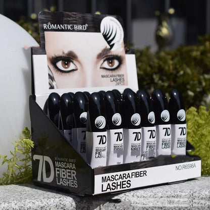 Black 7D mascara tube with brush showing separated lashes in waterproof formula
