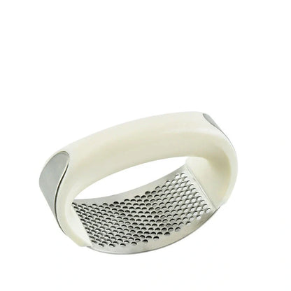 Stainless steel garlic press with non-slip handle for easy crushing