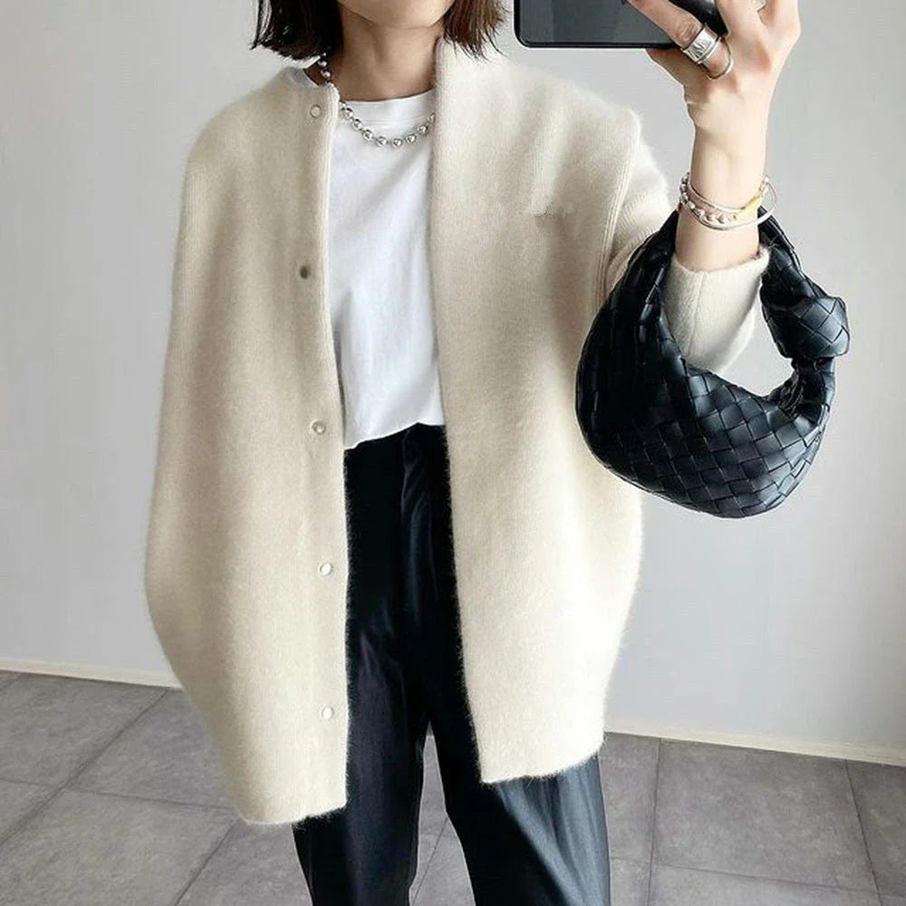 A stylish and cozy knit cardigan jacket in a variety of colors, perfect for autumn and winter wear