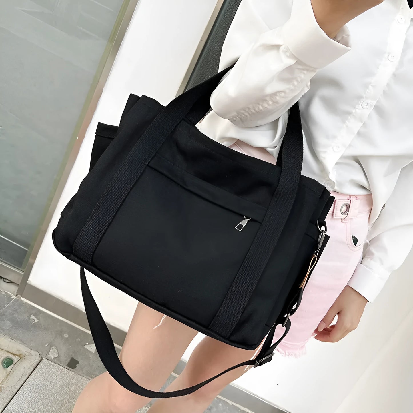 Large canvas tote bag in horizontal square shape with open-zip sides and internal organisers