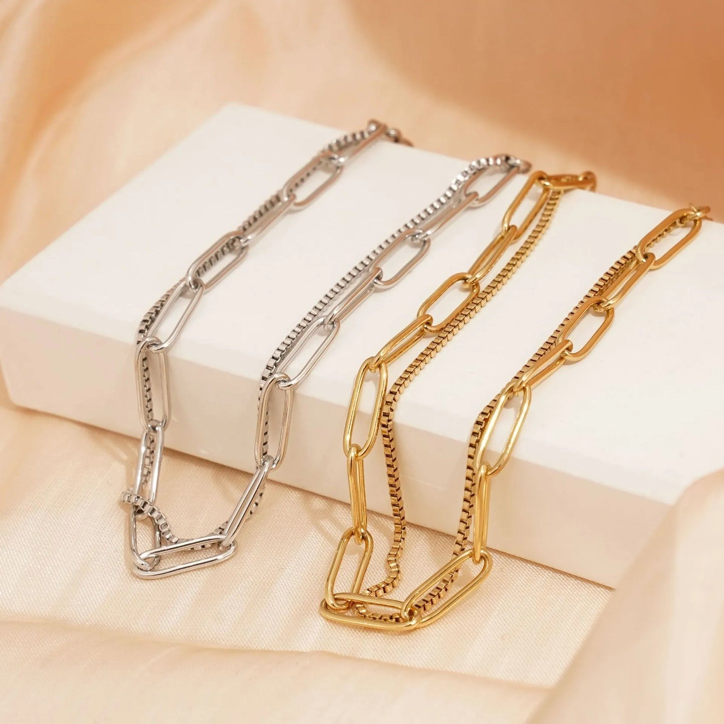 Double layer geometric women's bracelet in gold or silver electroplated finish with linear design elements