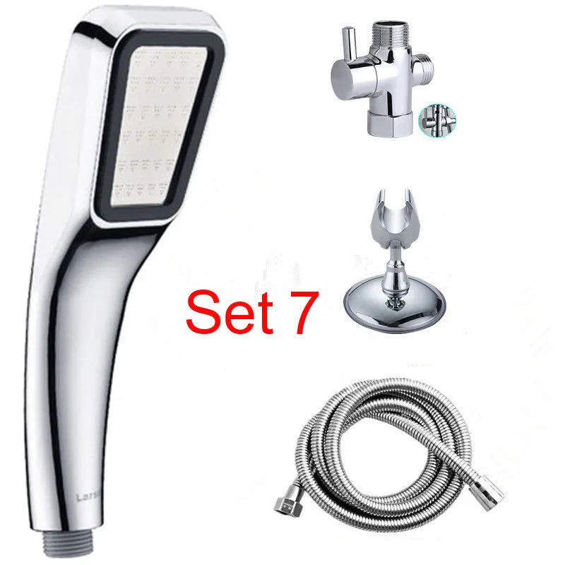 Orange hand-held pressurised shower head with rain function and attachment pieces