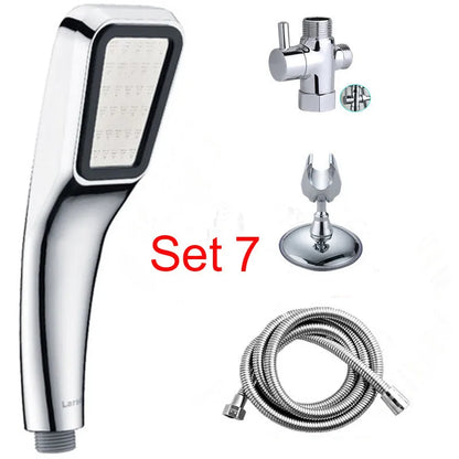 Orange hand-held pressurised shower head with rain function and attachment pieces