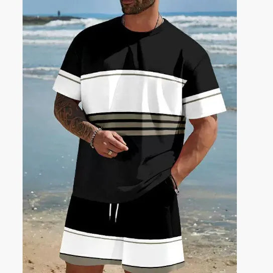 Man wearing a loose fit grey short-sleeved t-shirt and matching shorts from a summer leisure suit.