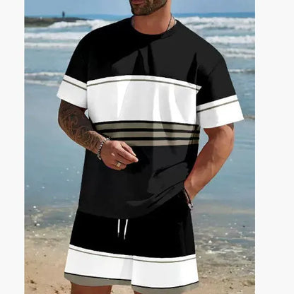 Man wearing a loose fit grey short-sleeved t-shirt and matching shorts from a summer leisure suit.
