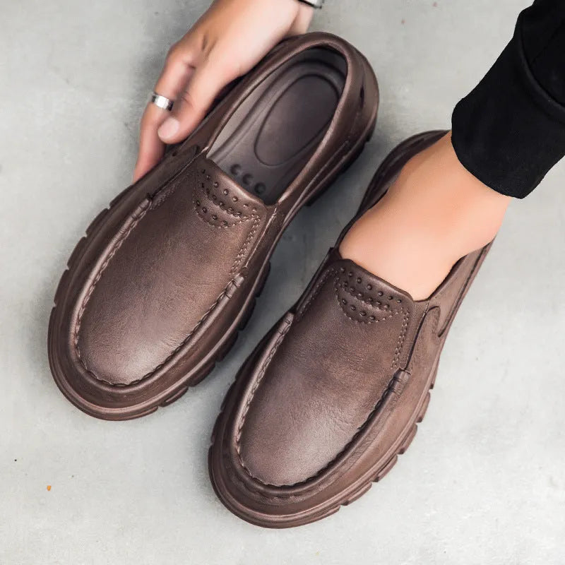 Men's black slip-on leather shoes with platform heel and round toe design