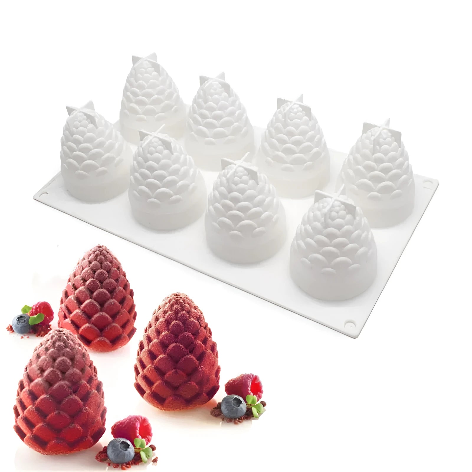 Flexible blue silicone baking mould with six cavities shaped like pineapples and pine cones on a kitchen counter.