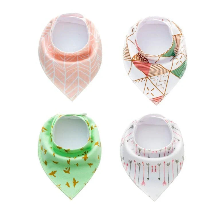 Set of four cotton baby bibs with arrow and wave designs for mess-free feeding