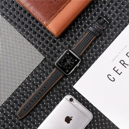 Leather Apple Watch strap with carbon fibre pattern case in red, black, orange, and blue colour options.