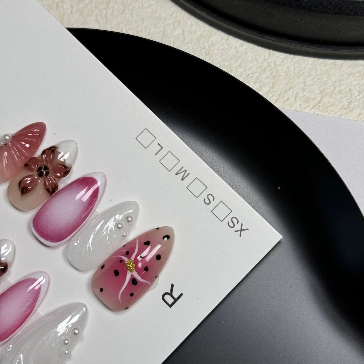 Hand-painted nail patches with three-dimensional carved embossed candy patterns in almond shape