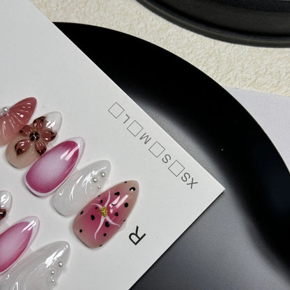 Hand-painted nail patches with three-dimensional carved embossed candy patterns in almond shape