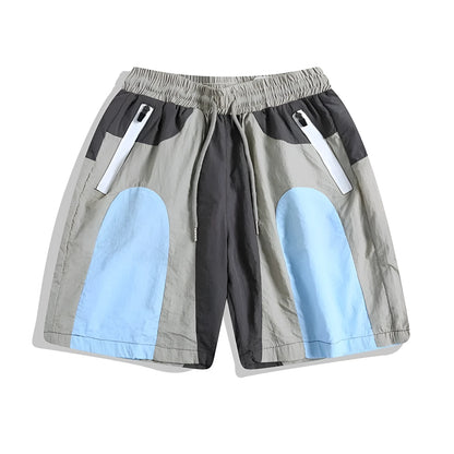 Blue men's loose-fit quick-drying outdoor sports shorts with straight legs and elastic waistband.