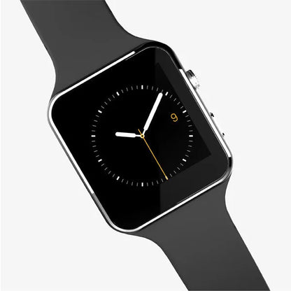 Black smart watch with 1.54-inch touchscreen display and silicone strap on a wrist