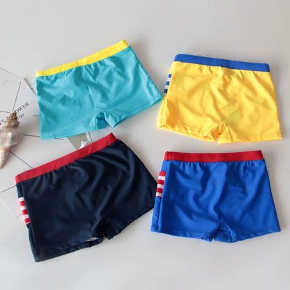 Boys' boxer swimming trunks in polyester, sizes 100-120, colours Black Royal Blue Water Blue Yellow