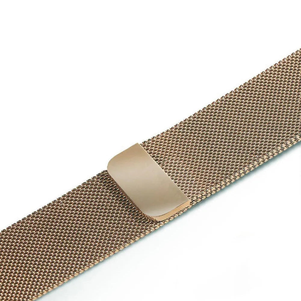 Stainless steel Apple Watch strap in silver on a wrist, showing the metal links and secure clasp.