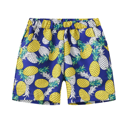 Multi-colour printed beach shorts with hairband belt on a mid-waist, shown in a casual summer style.