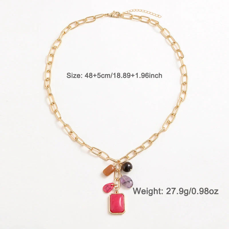 Elegant pendant necklace with a modern geometric design in vibrant colours, perfect for the discerning British woman.